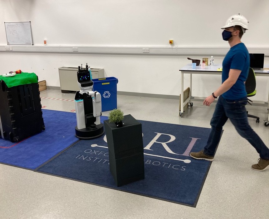 Human walking and robot working